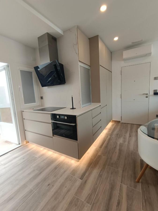 Lebana Plaza Dario Apartment Facinas Bagian luar foto