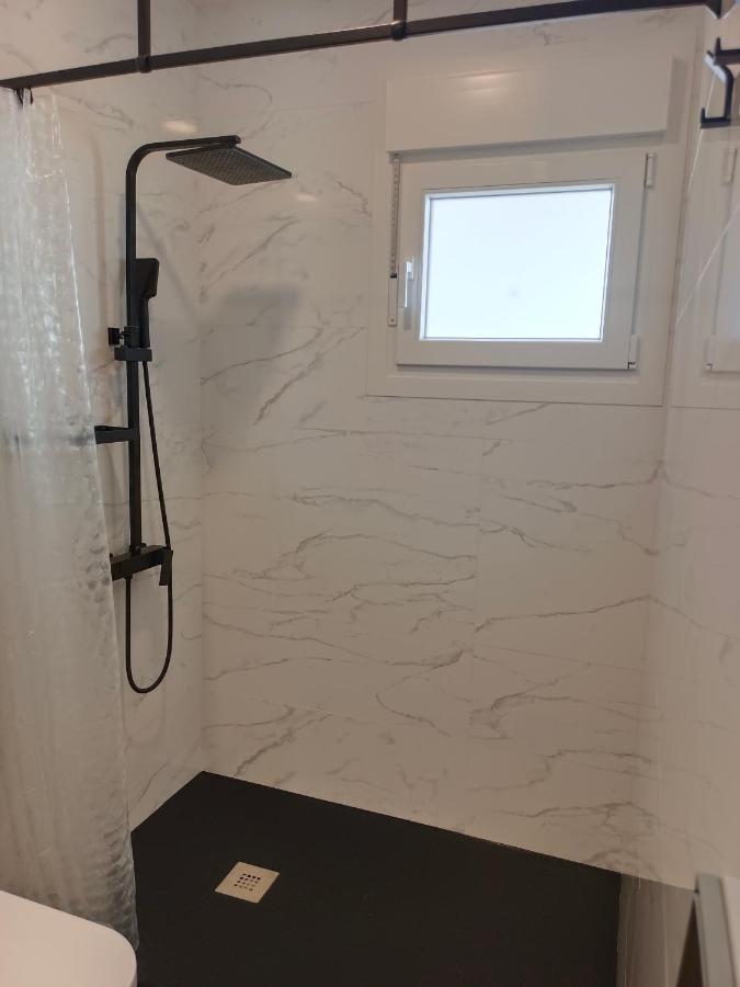 Lebana Plaza Dario Apartment Facinas Bagian luar foto